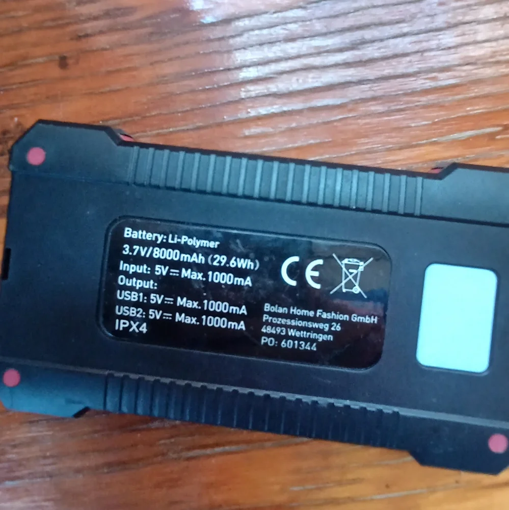 Solar powered phone charger w/ dual USB ports
